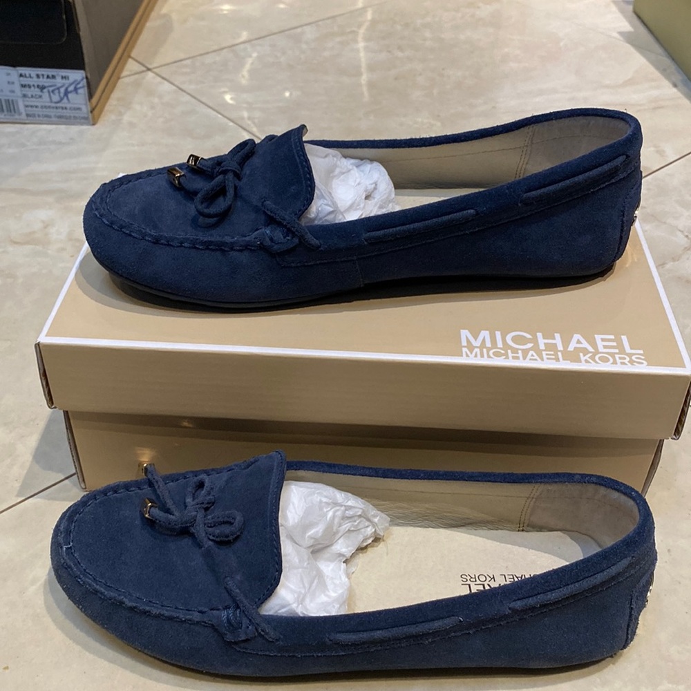 Brand new Michael Kors Navy Suede Moccasins size 8